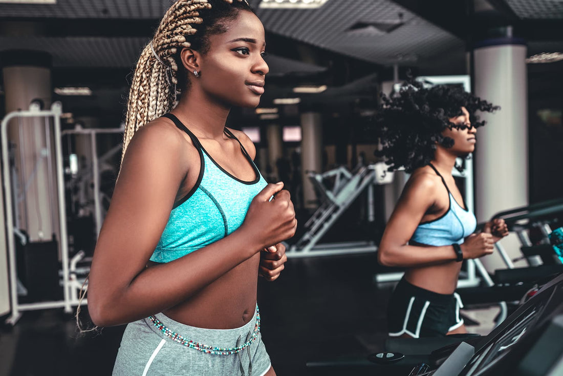 24kg adjustable dumbbells - african athletic women on running track