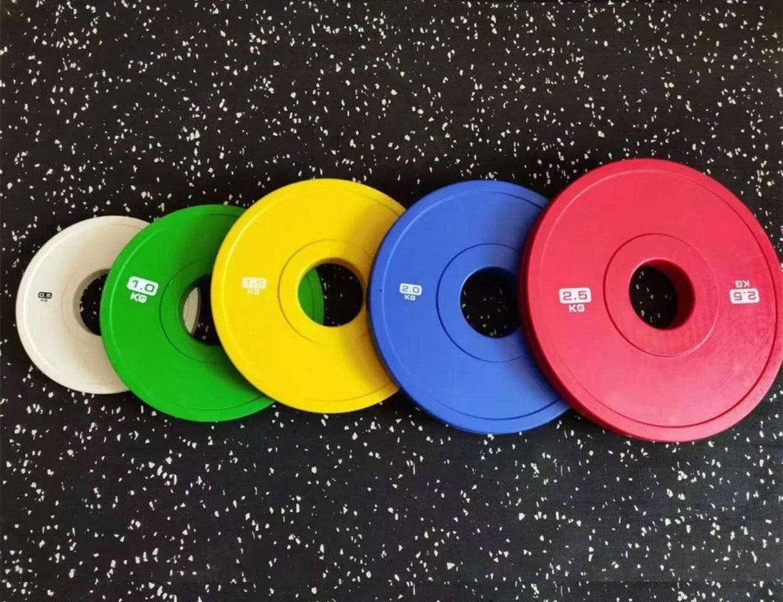 Why Do Olympic Weight Plates Have Coloured Rubber Coatings?