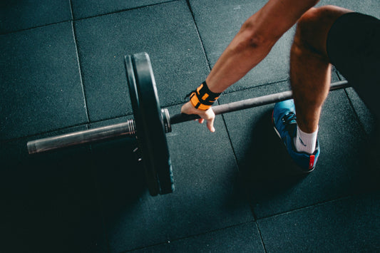 Olympic-grade weight plates - man weightlifting