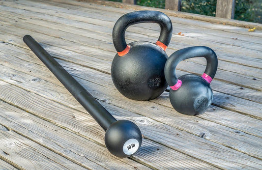macebells - steel mace (or macebell) and iron kettlebells